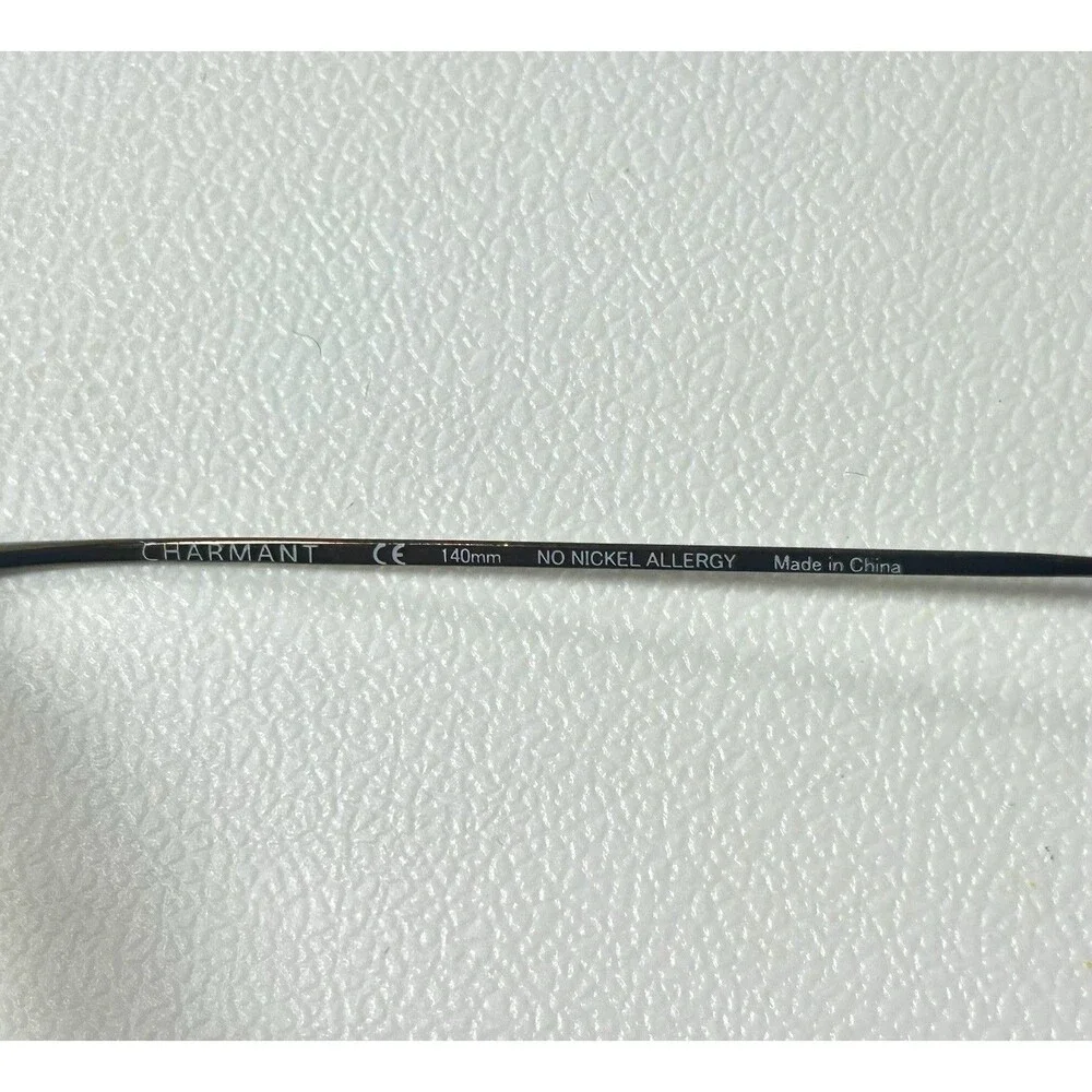 Charmant CH8600 Rimless Brown Titanium Eyeglasses 99-19-140mm